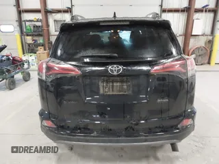 2018 Toyota RAV4 XLE with VIN 2T3RFREV0JW715761, listed as a IAAI auction lot 41881863 with 67,534 mi miles and . Bid and sale history available at DreamBid. Image 16.