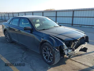2015 Chrysler 300 with VIN 2C3CCAGG8FH808618, listed as a IAAI auction lot 41695711 with 137,050 mi miles. Bid and sale history available at carsss.com. Image 1.