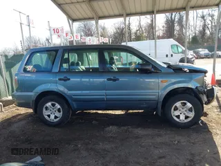 2006 Honda Pilot LX with VIN 2HKYF18156H542940, listed as a IAAI auction lot 41653949 with 152,321 mi miles and . Bid and sale history available at DreamBid. Image 14.
