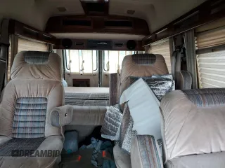 1992 Chevrolet Chevy Van z VIN 1GBEG25K2N7130047, wystawiony jako Copart lot #68682724 z przebiegiem 143 585 mil mil oraz Szkody całkowita. Historia ofert i sprzedaży dostępna na DreamBid. Obrazek 10.