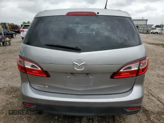 2015 Mazda 5 Sport z VIN JM1CW2BL2F0179147, wystawiony jako Copart lot #54125515 z przebiegiem 94 294 mil mil oraz Szkoda całkowita • Salvage title. Historia ofert i sprzedaży dostępna na DreamBid. Obrazek 6.