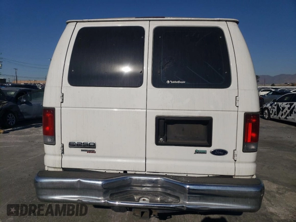 2012 Ford Econoline Cargo Recreational with VIN 1FTNE2EW6CDA00808, listed as a Copart auction lot 87967515 with 138,405 mi miles and Salvage title. Bid and sale history available at DreamBid. Image 6.