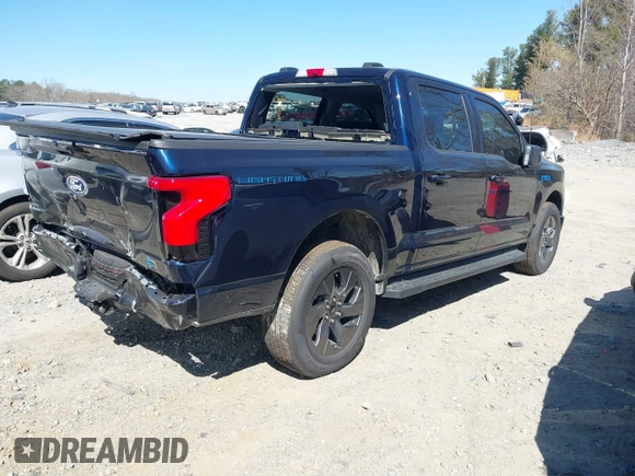2024 Ford F-150 Lightning Flash with VIN 1FT6W3L75RWG30755, listed as a IAAI auction lot 41817158 with 1,932 mi miles and . Bid and sale history available at DreamBid. Image 4.