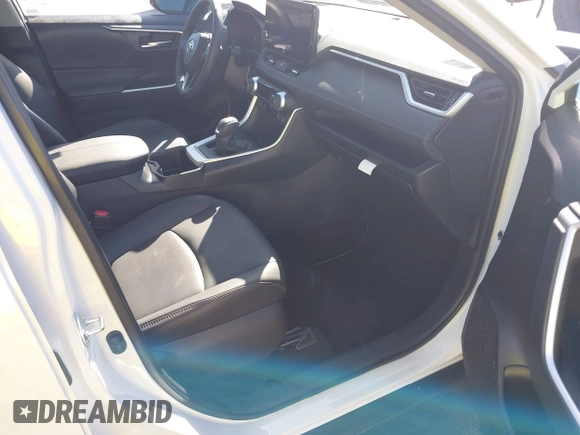 2023 Toyota RAV4 XLE Premium with VIN 2T3C1RFV7PW299428, listed as a IAAI auction lot 42527306 with 9,853 mi miles and . Bid and sale history available at DreamBid. Image 5.