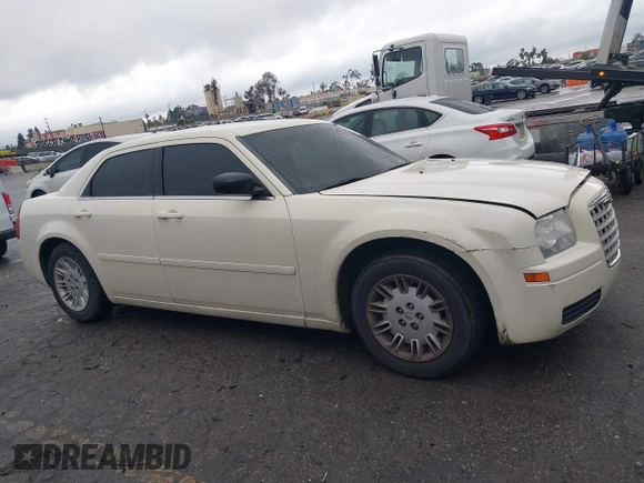 2006 Chrysler 300 with VIN 2C3KA43RX6H470150, listed as a IAAI auction lot 41767272 with 107,457 mi miles. Bid and sale history available at carsss.com. Image 13.