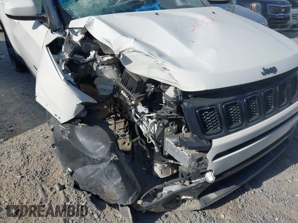 2021 Jeep Compass Altitude with VIN 3C4NJDBB2MT596181, listed as a IAAI auction lot 42026716 with 69,526 mi miles and . Bid and sale history available at DreamBid. Image 6.