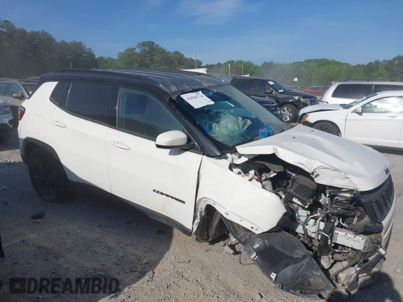2021 Jeep Compass Altitude with VIN 3C4NJDBB2MT596181, listed as a IAAI auction lot 42026716 with 69,526 mi miles and . Bid and sale history available at DreamBid. Image 13.