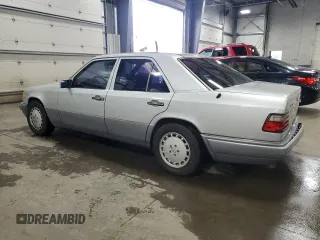 1995 Mercedes-Benz E 320 with VIN WDBEA32E2SC168493, listed as a Copart auction lot 82365704 with 102,066 mi miles and Salvage Title. Bid and sale history available at DreamBid. Image 2.