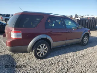 2008 Ford Taurus X SEL with VIN 1FMDK02W68GA27117, listed as a Copart auction lot 52310685 with 178,529 mi miles and Salvage Title. Bid and sale history available at DreamBid. Image 3.