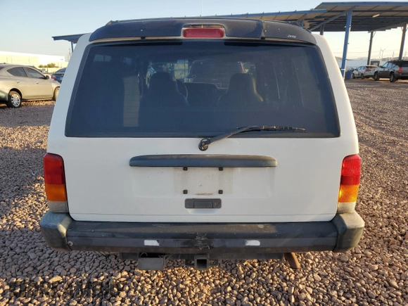 1997 Jeep Cherokee Sport z VIN 1J4FJ68S9VL594832, wystawiony jako Copart lot #53081675 z przebiegiem 167 028 mil mil oraz Czysty tytuł • Clean title. Historia ofert i sprzedaży dostępna na DreamBid. Obrazek 6.