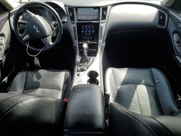 2015 Infiniti Q50 Premium z VIN JN1BV7AR2FM395478, wystawiony jako Copart lot #62843995 z przebiegiem 137 945 mil mil oraz Szkoda całkowita • Salvage title. Historia ofert i sprzedaży dostępna na DreamBid. Obrazek 8.