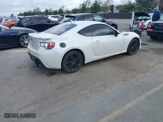 2014 Subaru BRZ Limited with VIN JF1ZCAC13E8606285, listed as a IAAI auction lot 41933255 with 135,576 mi miles. Bid and sale history available at carsss.com. Image 4.