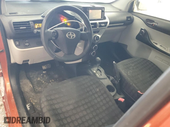 2015 Scion iQ with VIN JTNJJXB09FJ030667, listed as a Copart auction lot 87321594 with 124,895 mi miles and Salvage Title. Bid and sale history available at carsss.com. Image 8.