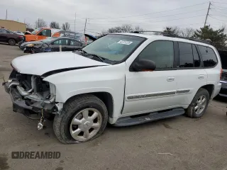 2003 GMC Envoy SLT with VIN 1GKDT13S332293112, listed as a Copart auction lot 43721225 with 139,471 mi miles and Salvage Title. Bid and sale history available at carsss.com. Image 1.