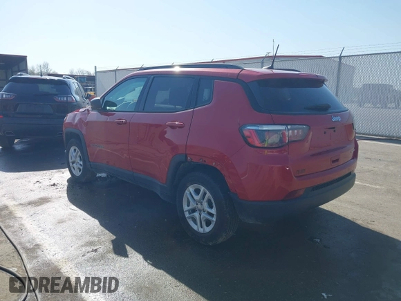 2018 Jeep Compass Sport with VIN 3C4NJCAB3JT255203, listed as a IAAI auction lot 42052746 with 112,451 mi miles and . Bid and sale history available at DreamBid. Image 3.