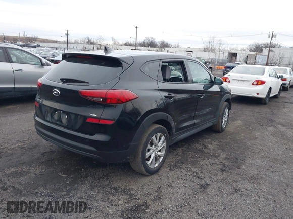 2019 Hyundai Tucson SE with VIN KM8J2CA47KU895799, listed as a IAAI auction lot 41141493 with 44,765 mi miles. Bid and sale history available at carsss.com. Image 4.