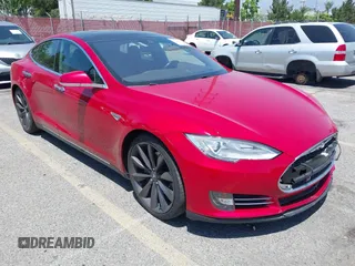 2016 Tesla Model S 90D with VIN 5YJSA1E26GF120631, listed as a IAAI auction lot 42249326 with 84,491 mi miles and . Bid and sale history available at DreamBid. Image 1.