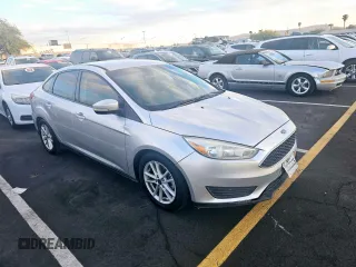 2017 Ford Focus SE z VIN 1FADP3F20HL254640, wystawiony jako Copart lot #78963754 z przebiegiem 151 848 mil mil oraz Czysty tytuł • Clean title. Historia ofert i sprzedaży dostępna na DreamBid. Obrazek 1.