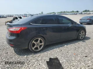 2014 Ford Focus Titanium with VIN 1FADP3J20EL347435, listed as a Copart auction lot 54947345 with 144,169 mi miles and Salvage title. Bid and sale history available at DreamBid. Image 3.