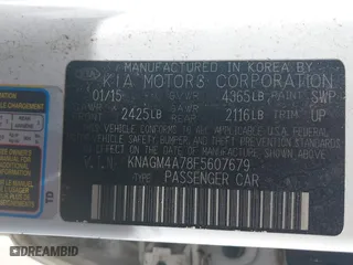 2015 Kia Optima LX with VIN KNAGM4A78F5607679, listed as a IAAI auction lot 42095899 with 125,164 mi miles. Bid and sale history available at carsss.com. Image 9.
