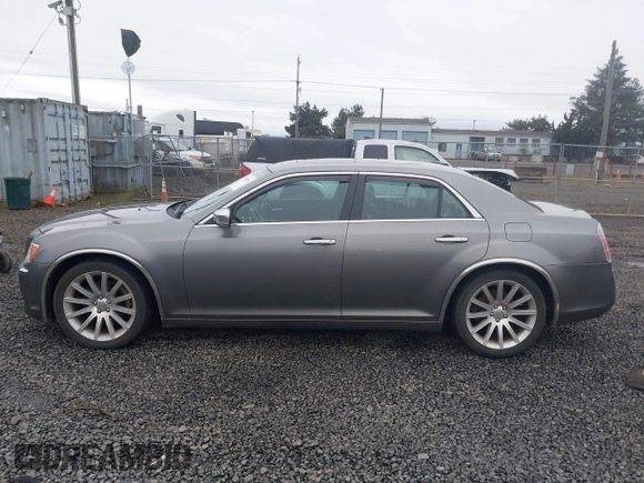 2011 Chrysler 300 with VIN 2C3CA6CT8BH547555, listed as a IAAI auction lot 41858626 with 141,853 mi miles. Bid and sale history available at carsss.com. Image 14.