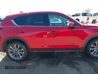 2019 Mazda CX-5 Grand Touring with VIN JM3KFADM5K1556917, listed as a IAAI auction lot 41706323 with 77,804 mi miles. Bid and sale history available at carsss.com. Image 13.