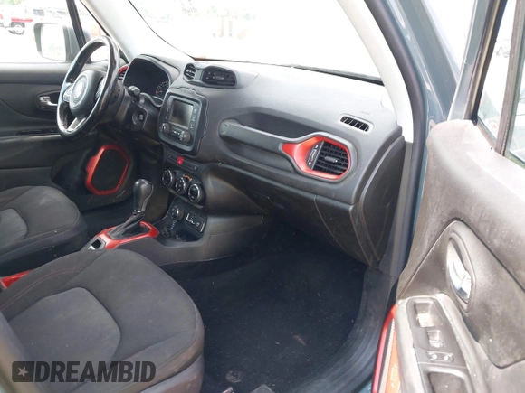 2015 Jeep Renegade Trailhawk with VIN ZACCJBCT8FPB33586, listed as a IAAI auction lot 42590207 with 127,168 mi miles and . Bid and sale history available at DreamBid. Image 5.