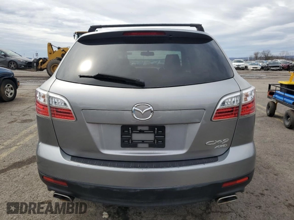 2010 Mazda CX-9 Grand Touring z VIN JM3TB3MV5A0210214, wystawiony jako Copart lot #51251585 z przebiegiem 138 885 mil mil oraz Szkoda całkowita • Salvage title. Historia ofert i sprzedaży dostępna na DreamBid. Obrazek 6.