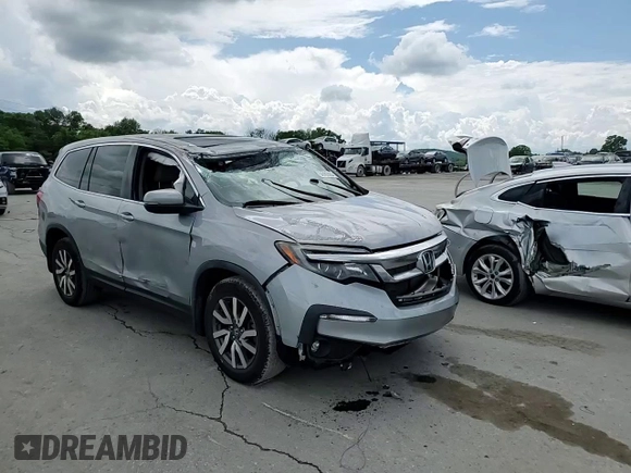 2021 Honda Pilot EX-L z VIN 5FNYF5H58MB008921, wystawiony jako Copart lot #56985395 z przebiegiem Nie podano mil oraz Szkoda całkowita • Salvage title. Historia ofert i sprzedaży dostępna na DreamBid. Obrazek 14.