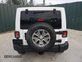 2016 Jeep Wrangler Unlimited Rubicon with VIN 1C4BJWFG7GL179689, listed as a Copart auction lot 48708935 with 138,118 mi miles and Clean Title. Bid and sale history available at carsss.com. Image 6.