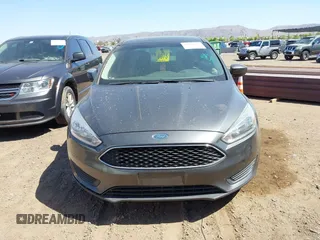 2018 Ford Focus SE with VIN 1FADP3FE6JL270910, listed as a IAAI auction lot 42130371 with 121,240 mi miles. Bid and sale history available at carsss.com. Image 12.