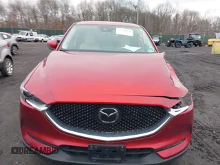 2018 Mazda CX-5 Grand Touring with VIN JM3KFBDM0J0427753, listed as a IAAI auction lot 41740838 with 69,683 mi miles and . Bid and sale history available at DreamBid. Image 12.