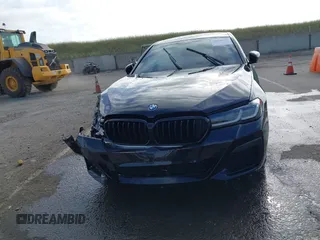 2023 BMW 5 Series 530e with VIN WBA13AG09PCL56556, listed as a IAAI auction lot 42098427 with Not provided miles and . Bid and sale history available at DreamBid. Image 12.