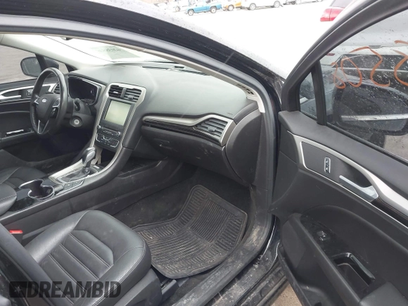 2016 Ford Fusion Energi SE Luxury with VIN 3FA6P0PU2GR322430, listed as a IAAI auction lot 42038508 with 114,980 mi miles. Bid and sale history available at carsss.com. Image 5.