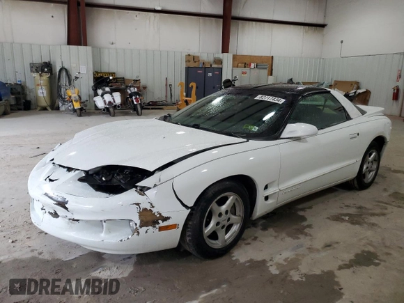 1998 Pontiac Firebird Firebird z VIN 2G2FS22KXW2207621, wystawiony jako Copart lot #82717434 z przebiegiem 63 973 mil mil oraz Szkoda całkowita • Salvage title. Historia ofert i sprzedaży dostępna na DreamBid. Obrazek 1.