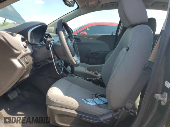 2018 Chevrolet Sonic LS with VIN 1G1JB5SH0J4125145, listed as a Copart auction lot 49402054 with 75,850 mi miles and Salvage title. Bid and sale history available at DreamBid. Image 7.