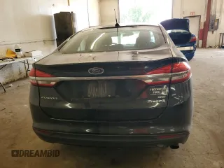 2017 Ford Fusion Hybrid SE z VIN 3FA6P0LU2HR247283, wystawiony jako Copart lot #62571495 z przebiegiem 167 042 mil mil oraz Nie do naprawy • Non repairable. Historia ofert i sprzedaży dostępna na DreamBid. Obrazek 6.