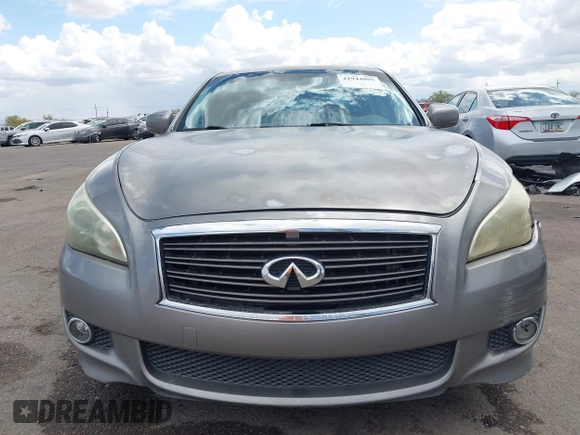 2012 Infiniti M with VIN JN1BY1AP3CM332453, listed as a IAAI auction lot 41944895 with 176,989 mi miles and . Bid and sale history available at DreamBid. Image 13.