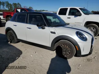 2024 MINI Hardtop 4 Door Cooper Classic with VIN WMW33DK00R2U88843, listed as a Copart auction lot 82409674 with 6,701 mi miles and Salvage Title. Bid and sale history available at DreamBid. Image 4.