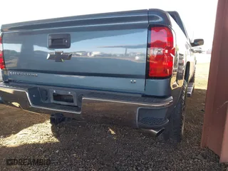 2014 Chevrolet Silverado 1500 LT with VIN 1GCRCREC5EZ335263, listed as a IAAI auction lot 41414079 with 126,039 mi miles. Bid and sale history available at carsss.com. Image 4.