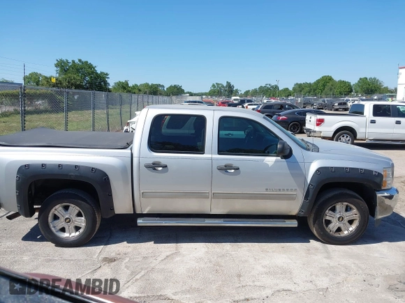 2013 Chevrolet Silverado 1500 LT with VIN 3GCPKSE71DG203443, listed as a IAAI auction lot 42033447 with 128,904 mi miles. Bid and sale history available at carsss.com. Image 13.