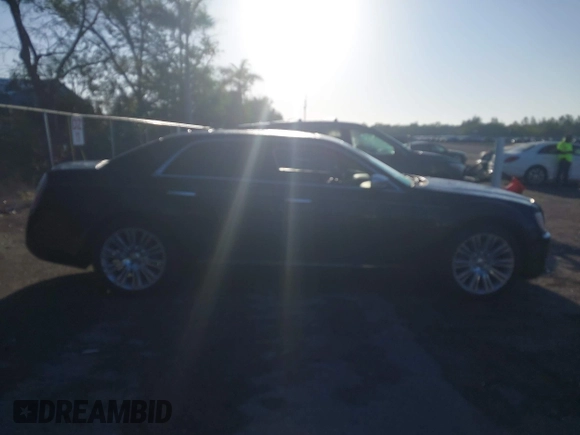 2012 Chrysler 300 C Luxury Series with VIN 2C3CCAPT3CH251755, listed as a IAAI auction lot 41935653 with 62,397 mi miles and . Bid and sale history available at carsss.com. Image 14.