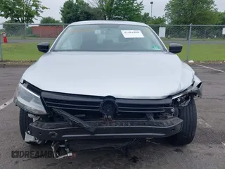 2014 Volkswagen Jetta S z VIN 3VW2K7AJ7EM217758, wystawiony jako IAAI lot #42461868 z przebiegiem 141 962 mil mil oraz . Historia ofert i sprzedaży dostępna na DreamBid. Obrazek 12.