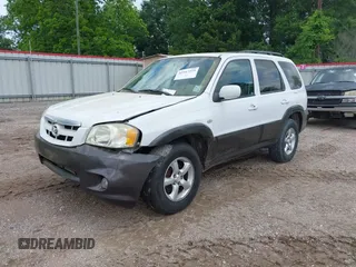 2006 Mazda Tribute i with VIN 4F2YZ02Z56KM31953, listed as a IAAI auction lot 42167223 with 185,169 mi miles and . Bid and sale history available at carsss.com. Image 2.