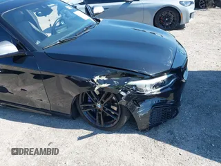 2019 BMW 2 Series M240i with VIN WBA2J5C53KVC07918, listed as a IAAI auction lot 42039042 with 46,133 mi miles and . Bid and sale history available at carsss.com. Image 6.