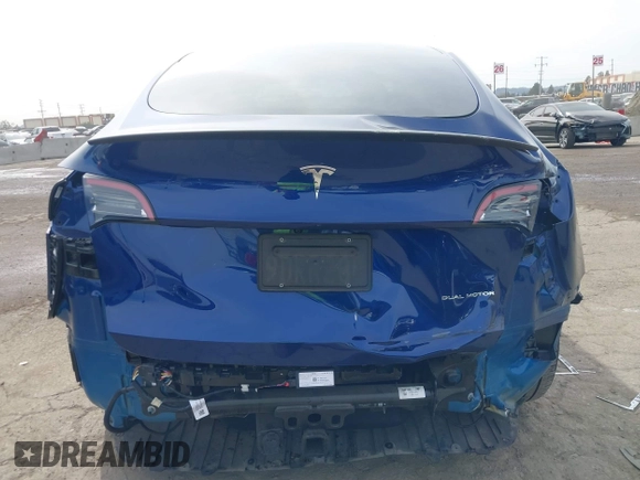 2022 Tesla Model Y Long Range with VIN 7SAYGDEE0NA019067, listed as a IAAI auction lot 41645198 with 49,336 mi miles and . Bid and sale history available at DreamBid. Image 17.