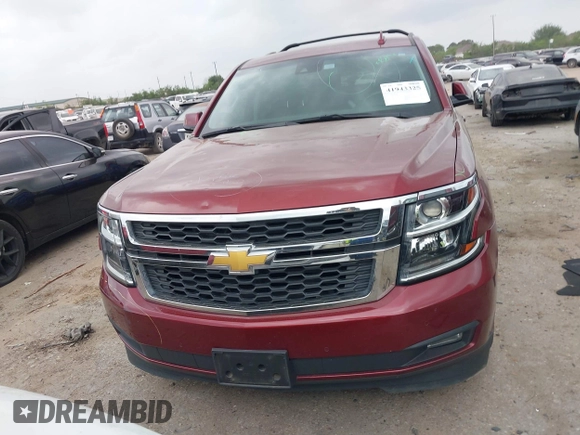 2020 Chevrolet Suburban LT z VIN 1GNSCHKC9LR233596, wystawiony jako IAAI lot #41943325 z przebiegiem 97 515 mil mil oraz . Historia ofert i sprzedaży dostępna na DreamBid. Obrazek 12.