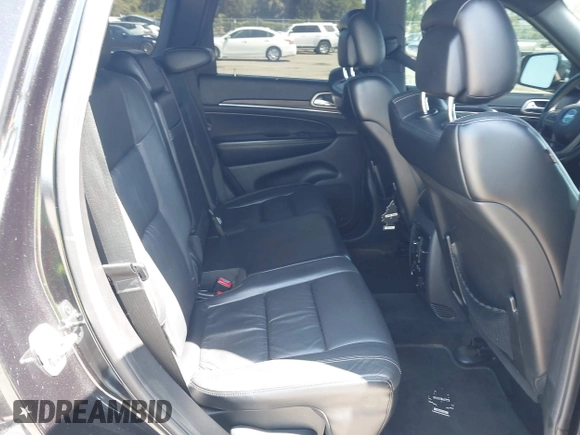 2015 Jeep Grand Cherokee Limited with VIN 1C4RJFBG8FC790575, listed as a IAAI auction lot 42124709 with 248,827 mi miles. Bid and sale history available at carsss.com. Image 8.