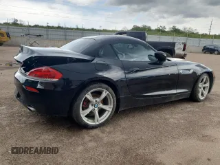 2011 BMW Z4 sDrive35i z VIN WBALM7C51BE383595, wystawiony jako Copart lot #54887695 z przebiegiem Nie podano mil oraz Szkody całkowita. Historia ofert i sprzedaży dostępna na DreamBid. Obrazek 3.