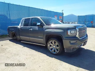 2017 GMC Sierra 1500 Denali z VIN 3GTU2PEJ8HG332863, wystawiony jako IAAI lot #41861256 z przebiegiem 132 051 mil mil oraz . Historia ofert i sprzedaży dostępna na DreamBid. Obrazek 1.
